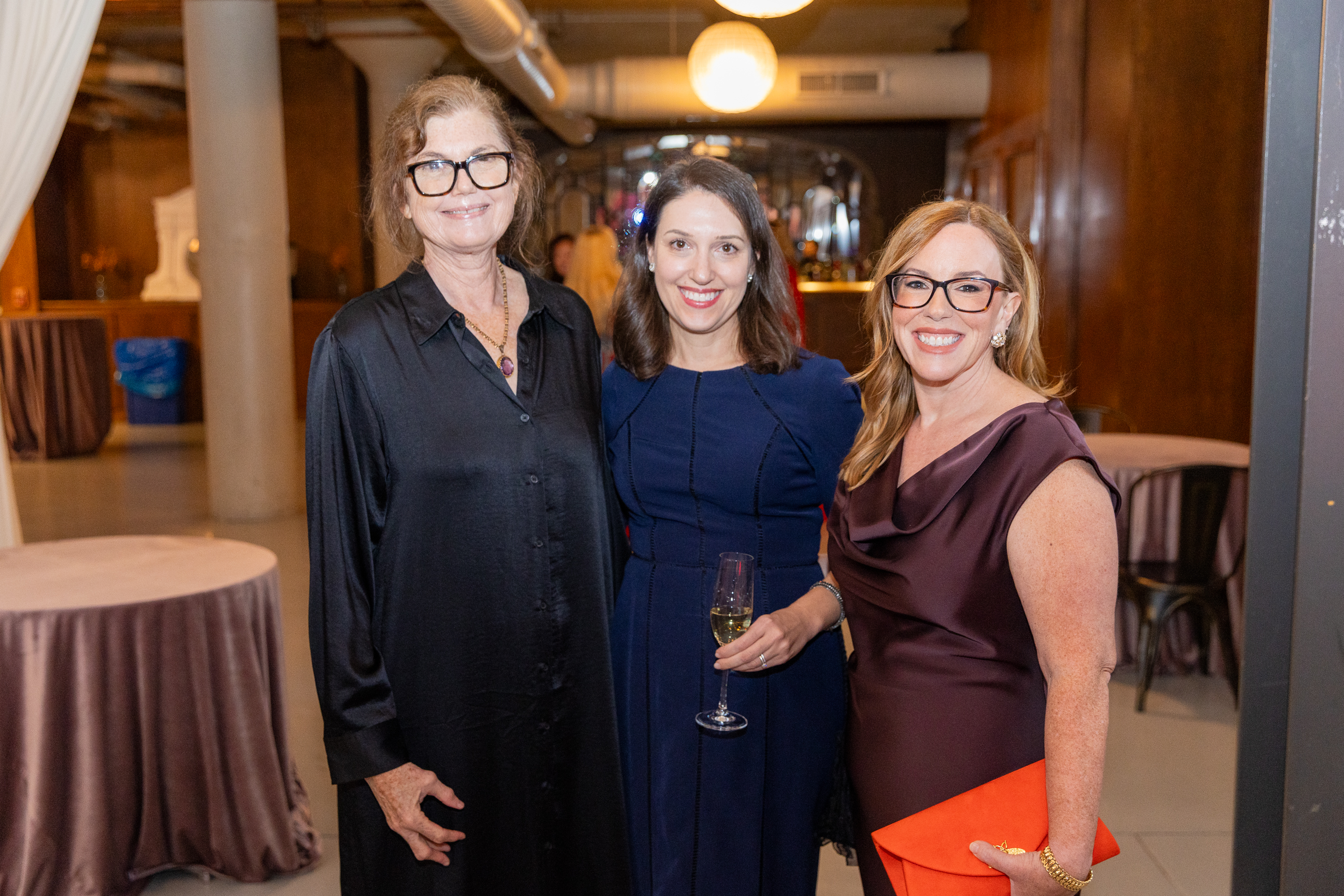 Adriana Reyner, Dayna Dion and event chair Christina Kline
